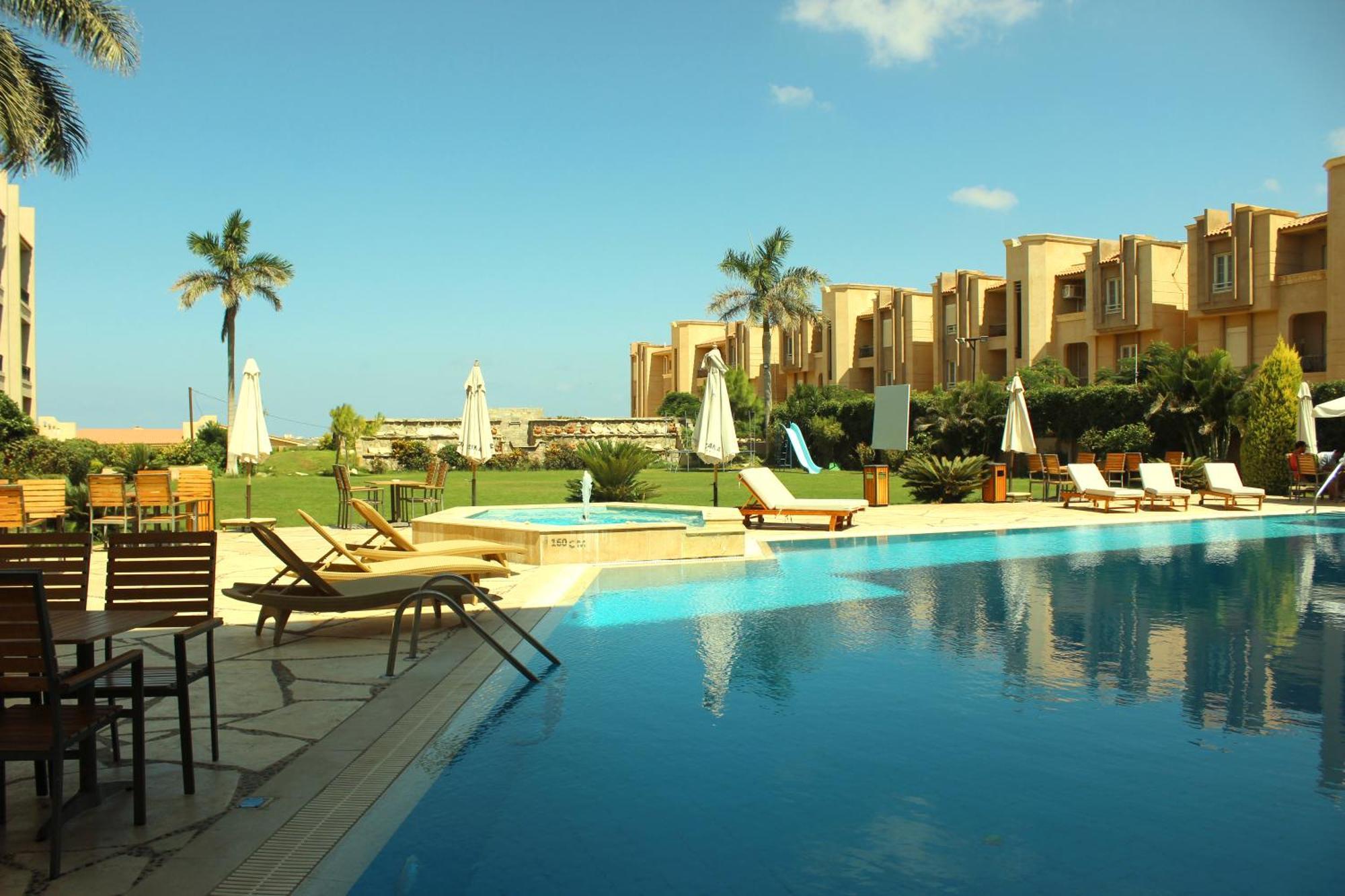 Panacea Suites Hotel Borg El Arab Exterior photo