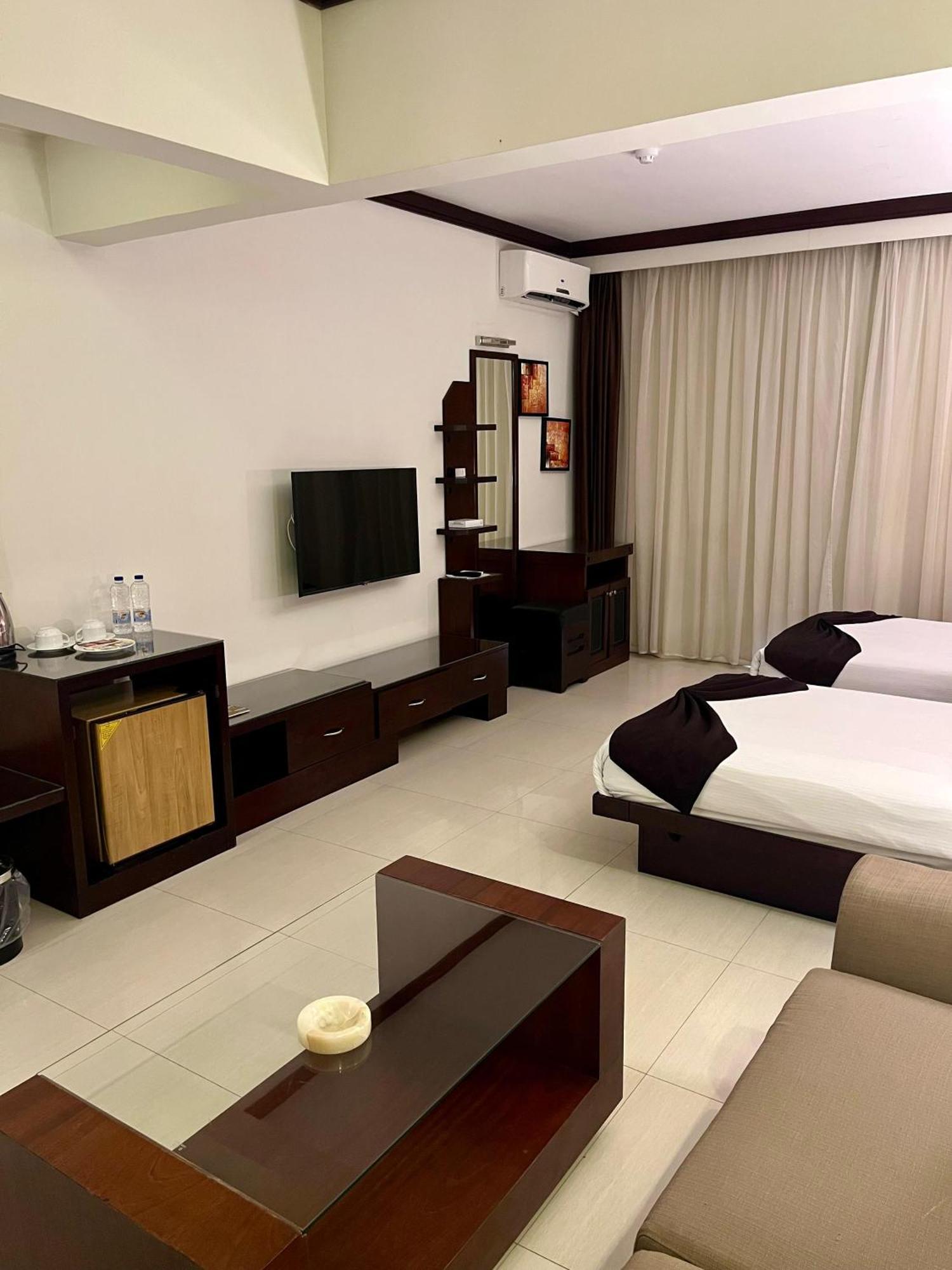 Panacea Suites Hotel Borg El Arab Exterior photo
